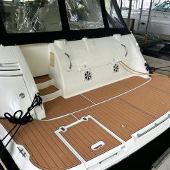 Alternative view of Cruisers Yachts 3870 Swim Platform Cockpit Pad EVA Teak Floor Mat
