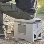Portable folding travel toilet with storage wings and odour-proof lid